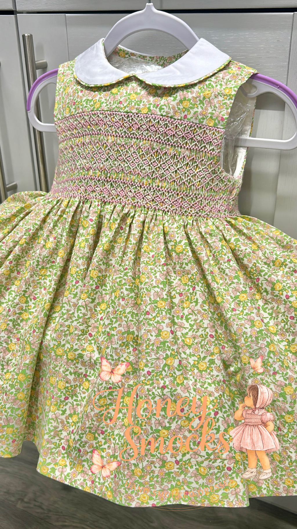 Yellow sleeveless floral dress