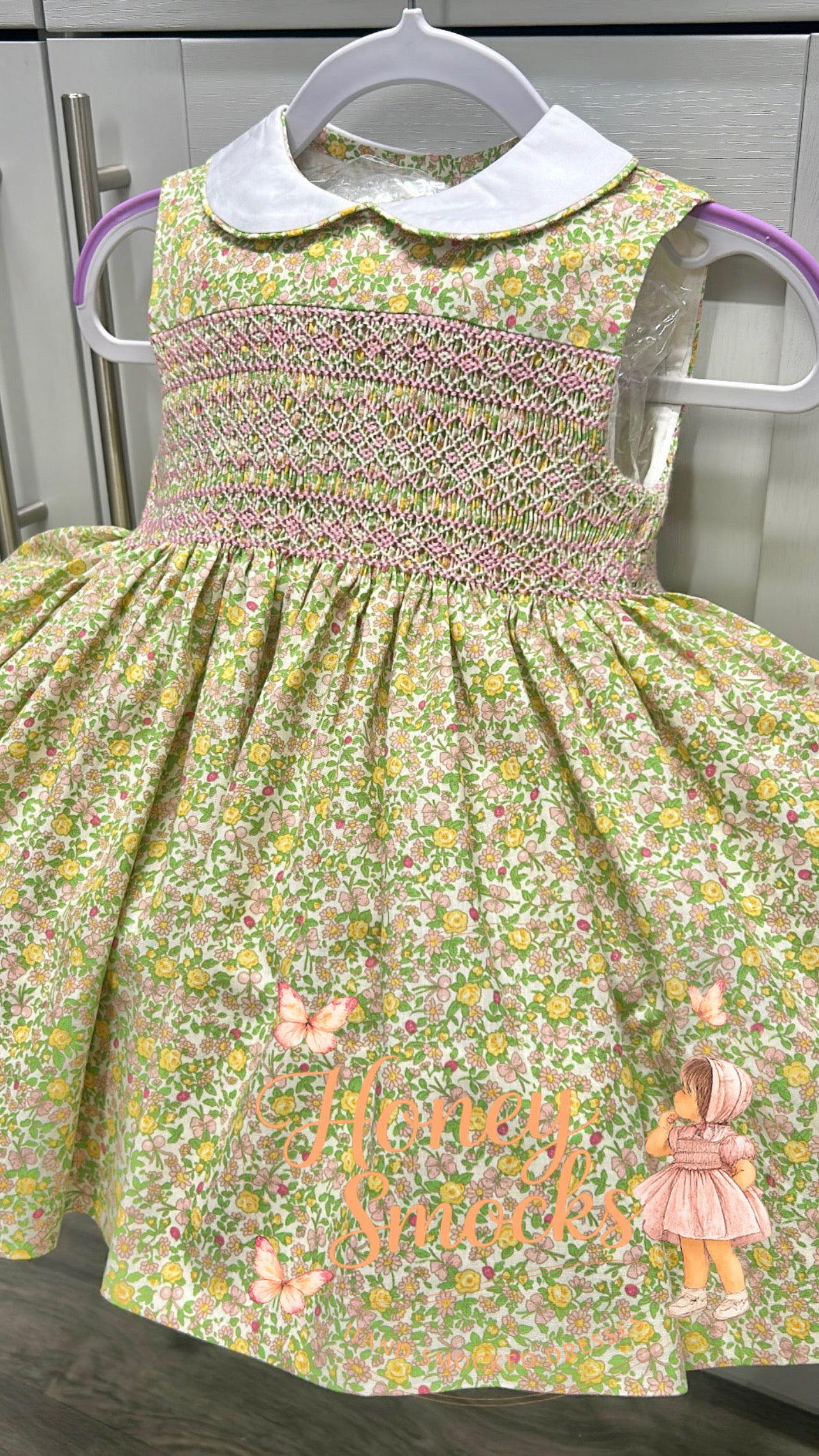 Yellow sleeveless floral dress