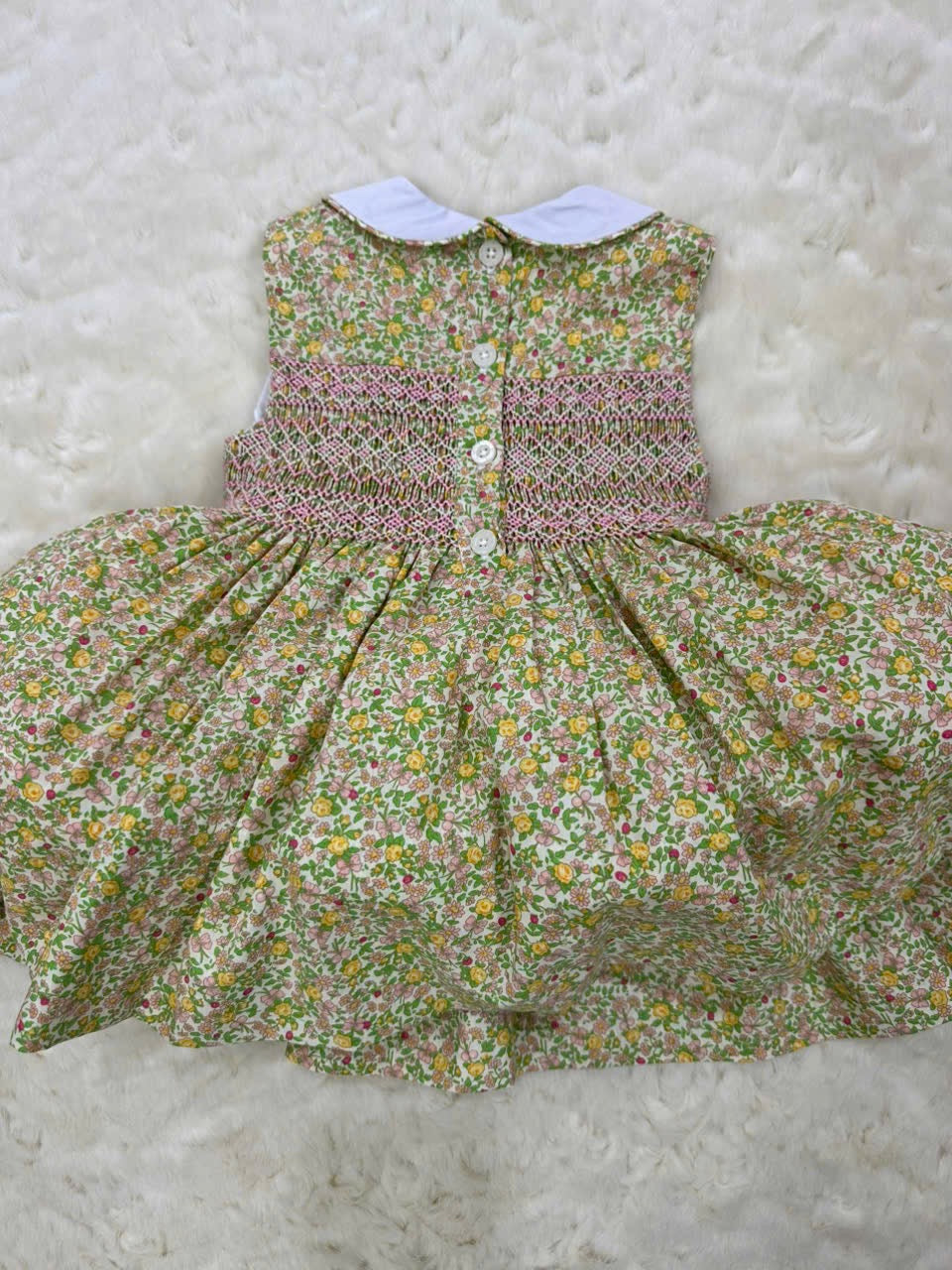 Yellow sleeveless floral dress