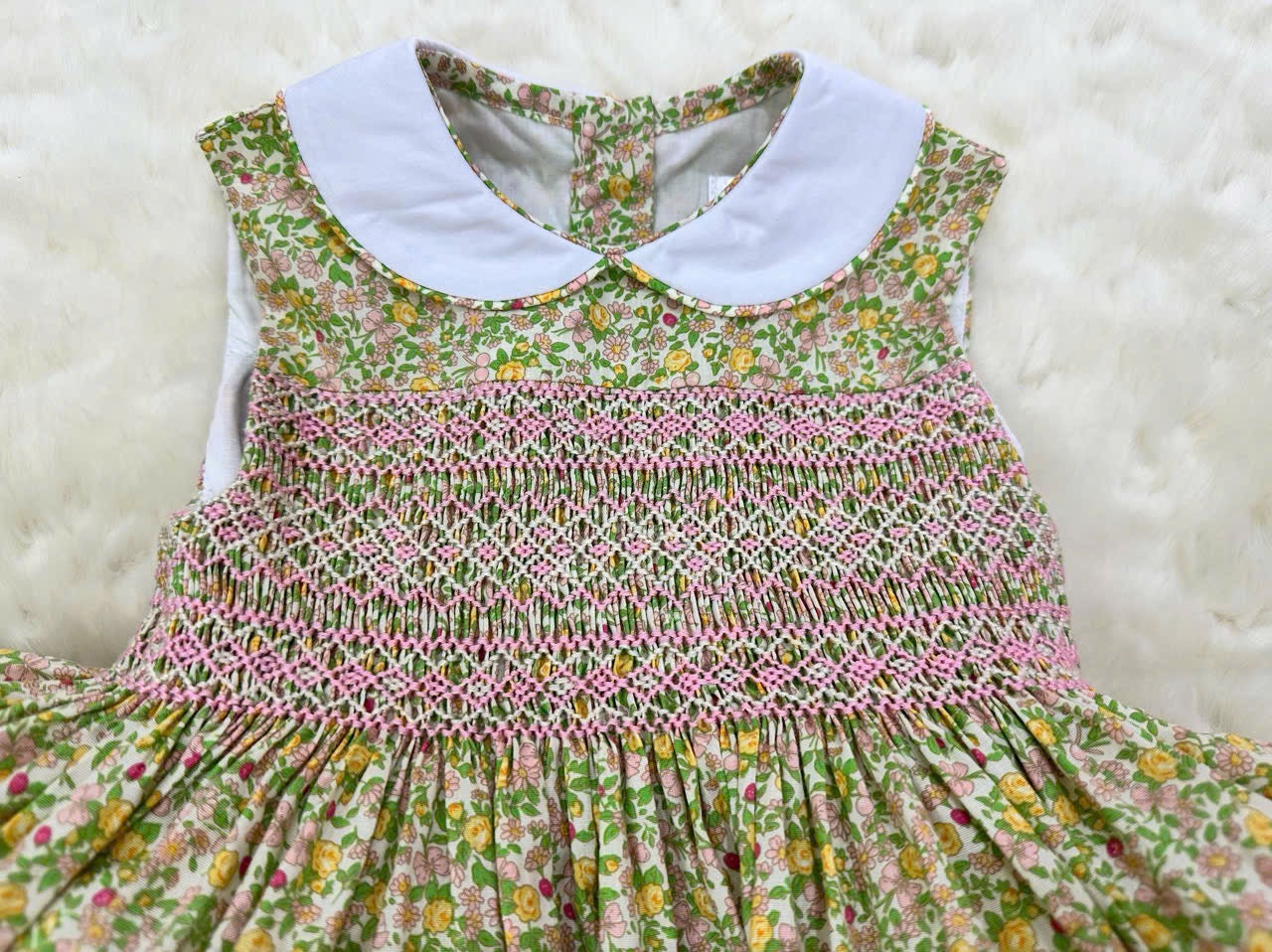 Yellow sleeveless floral dress